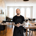 Chef Matt Blackwell in the dining room at Pneuma.