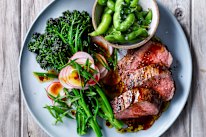Soy-marinated steak with broccolini and edamame salad.