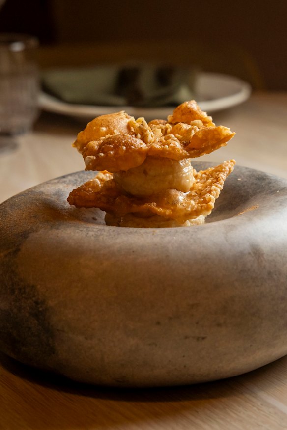 The “bougatsa” dessert, combining fried dough, custard and walnuts.