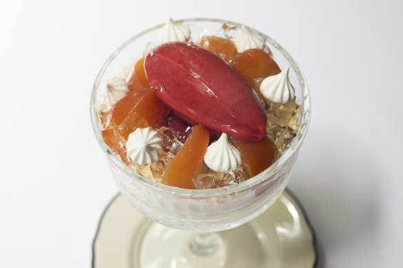 Peach Melba with poached peach, toasted meringue, vanilla and raspberry.
