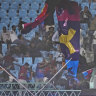 Strong winds saw stadium banners crash among spectators in Lucknow.