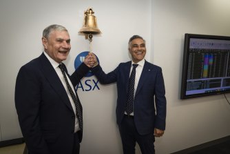Latitude Financial chairman Mike Tilley with managing director Ahmed Fahour at the company’s ASX debut on Tuesday. 
