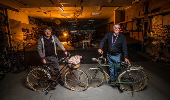 Finish line: Brothers Trevor and Geoff Hope at their Footscray shop, Ted's Cycles, which will close after 83 years on Friday. 