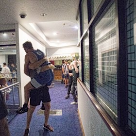 David Williams celebrates with friends after winning the fight.