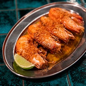 MuMu’s king prawns fried with brown butter and coriander.