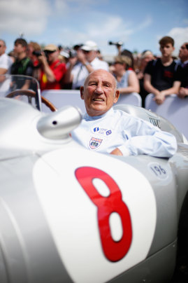 Sir Stirling Moss sitting in his Mercedes before driving up the hill at Goodwood on June 27, 2015 in Chichester, England. 
