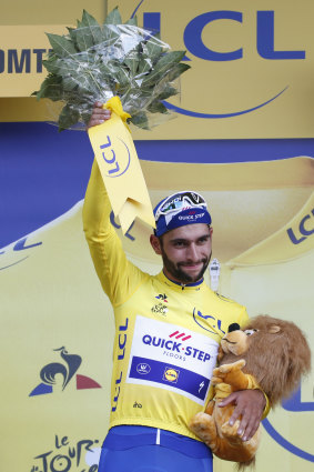 In yellow: Stage winner and overall leader Fernando Gaviria of Colombia. 