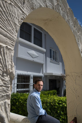 Marc Burman, 20, in front of an apartment building in Bondi, in which he has invested through the BrickX platform.