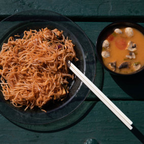 Kinn Niyom's pad Thai with chicken and tom yum soup.