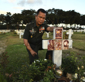 Major General Cirilito Sobejana, the recipient of the medal of valor, pays his respects to one of his men who died in the Battle of Marawi and is buried at the National Hero’s Cemetery in Manila, Philippines.