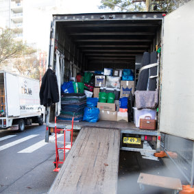 Residents are allowed back into the building to remove their belongings. 