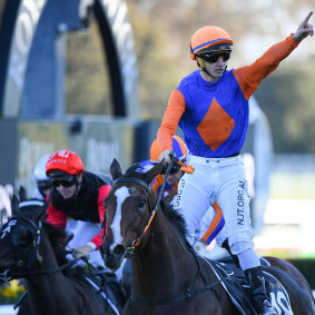 James Innes celebrates after crossing the cross in the Doncaster