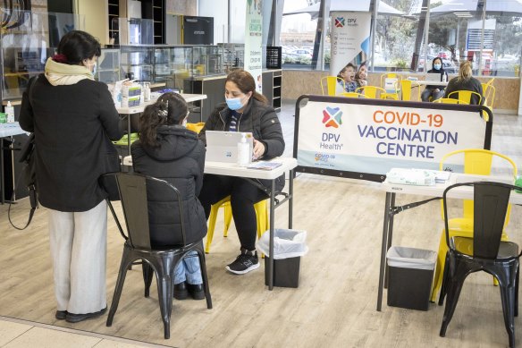 People at a walk-in vaccination centre in   Broadmeadows on Friday.