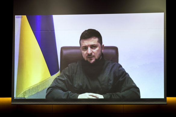 Ukrainian President Volodymyr Zelensky addresses Japan’s lower house of parliament via video link at the House of Representatives office building in Tokyo, Japan.