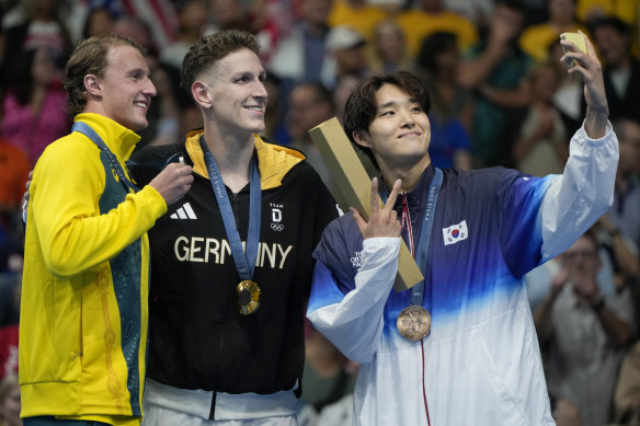 Elijah Winnington (left) won silver in the 400m, behind German Lukas Meartens and in front of South Korean Kim Woo-min.