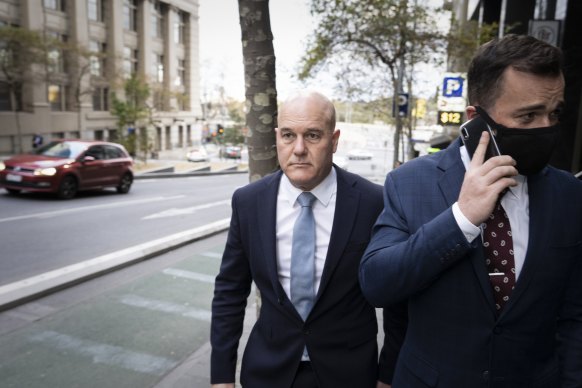 Xavier Walsh, left, leaving the royal commission last month.