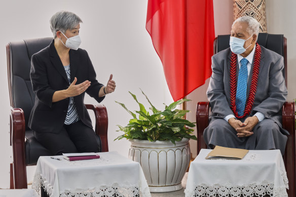 Australian Foreign Minister Penny Wong gestures as she speaks to the head of state for Samoa, Tuimalealiifano Vaaletoa Sualauvi II, at his official residence in Vailele, Samoa.