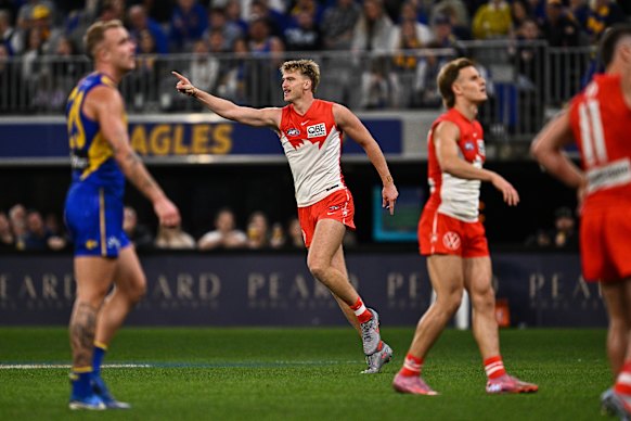 Jack Buller of the Swans celebrates a goal.