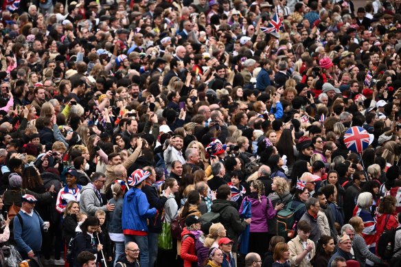 People on The Mall cheer Queen Elizabeth on the last of four days of celebrations to mark her Platinum Jubilee.