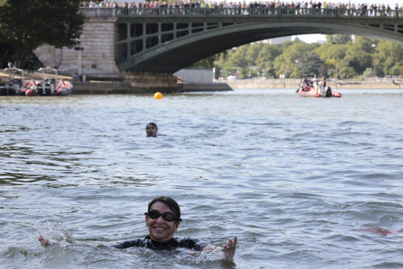 Paris Mayor Anne Hidalgo swims in the River Seine after her vow that it would be clean for the Olympics.