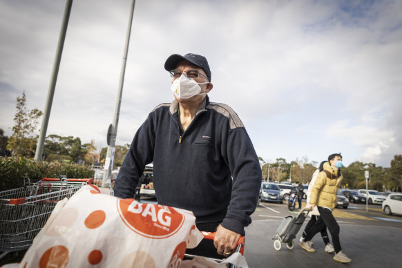 A shopper at Barkly Square in Brunswick during the pandemic. The shopping centre and a Coles within it have now been listed as exposure sites. 