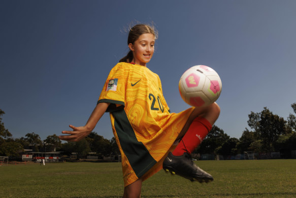 Zara, wearing Sam Kerr’s jersey,  dreams of emulating her hero and playing as a striker for the Matildas.