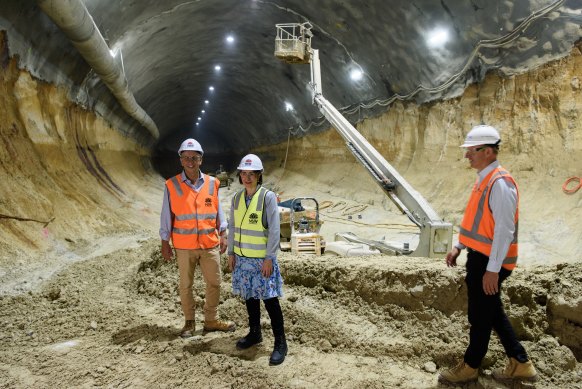 Transport Minister Andrew Constance, left, and Premier Gladys Berejiklian inspect one of the station sites last year. 