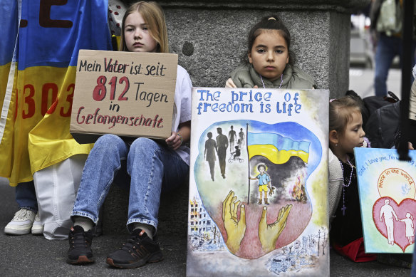 Children attend a rally during the Summit on Peace in Lucerne, Switzerland.