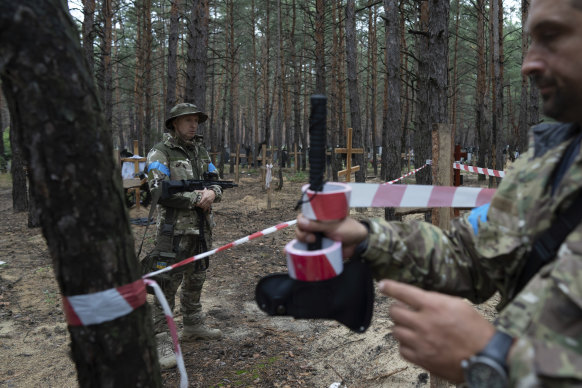 Oleg Kotenko, the commissioner for issues of missing persons under special circumstances, looks at the unidentified graves of civilians and Ukrainian soldiers in the recently retaken area of Izyum, Ukraine.