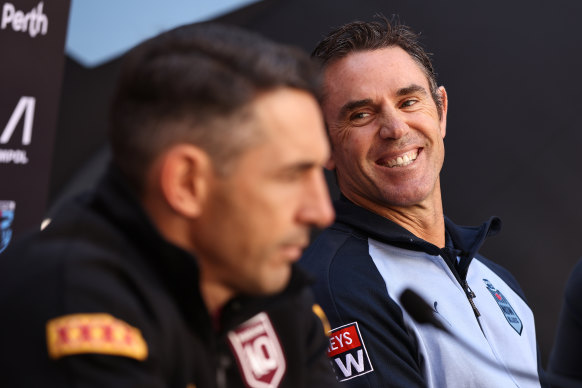 NSW coach Brad Fittler looking relaxed next to Queensland counterpart Billy Slater during the Origin II lead-up.