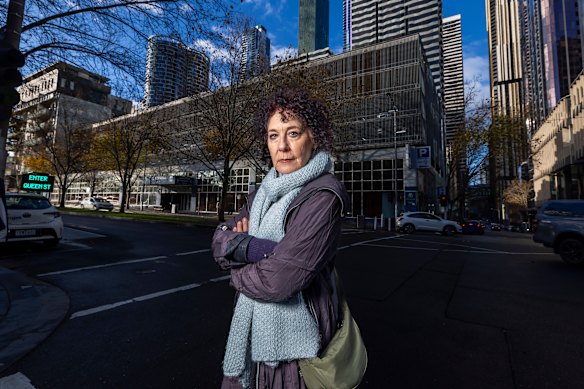 Mary-Lou Howie, standing in front of 380 Queen Street, is concerned about the proposed skyscraper’s impact on nearby Queen Victoria Market.