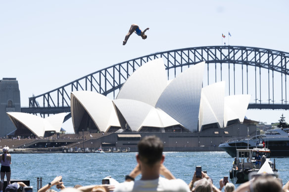 Rhiannan Iffland diving off the tower in the first round of the series on Sydney Harbour.