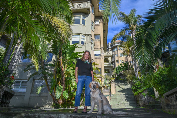 Heather Nette King with her dog, Sunday, out front of Beverley Hills.