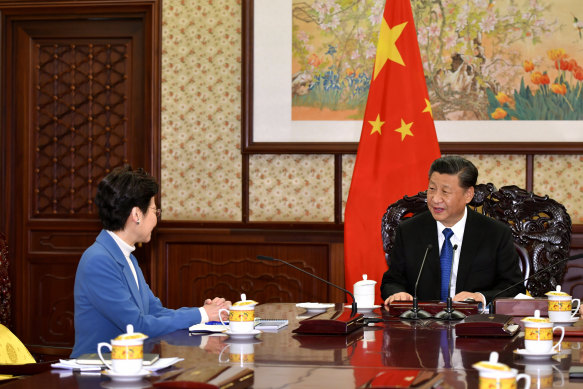 Hong Kong chief executive Carrie Lam meets with Chinese President Xi Jinping in December 2019.