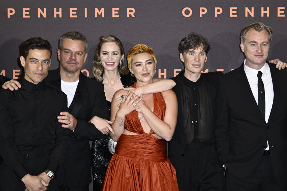 Oppenheimer cast members Rami Malek, Matt Damon, Emily Blunt, Florence Pugh, Cillian Murphy with director Christopher Nolan before the actors left the film’s London premiere.