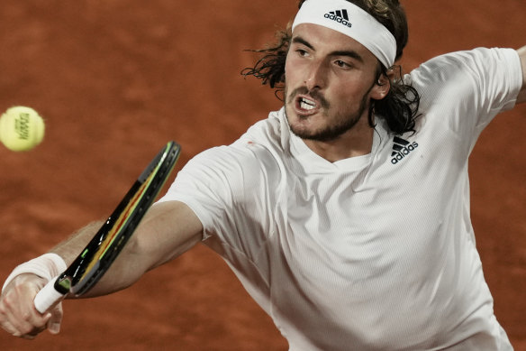 Stefanos Tsitsipas hits the ball to Daniil Medvedev in their last clash, at the French Open in 2021.