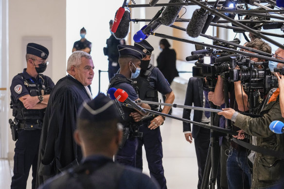 Thierry Herzog, the lawyer for former French president Nicolas Sarkozy, speaks to the media after the verdict.