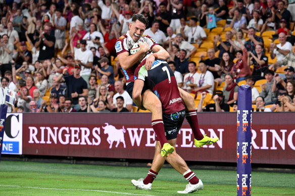 Reds players celebrate a winning performance against the Waratahs at Suncorp Stadium on the weekend.