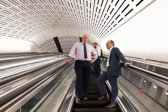 TFL’s Andy Lord (left) and Sydney Metro chief executive Peter Regan survey North Sydney’s new Victoria Cross station. 