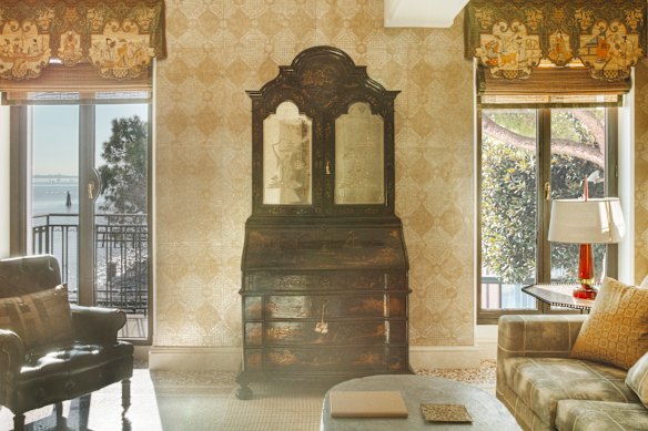 The redesigned Serenissima suite with Venetian antique bureau.