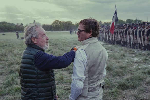 Director Ridley Scott and Joaquin Phoenix on the set of Napoleon. 