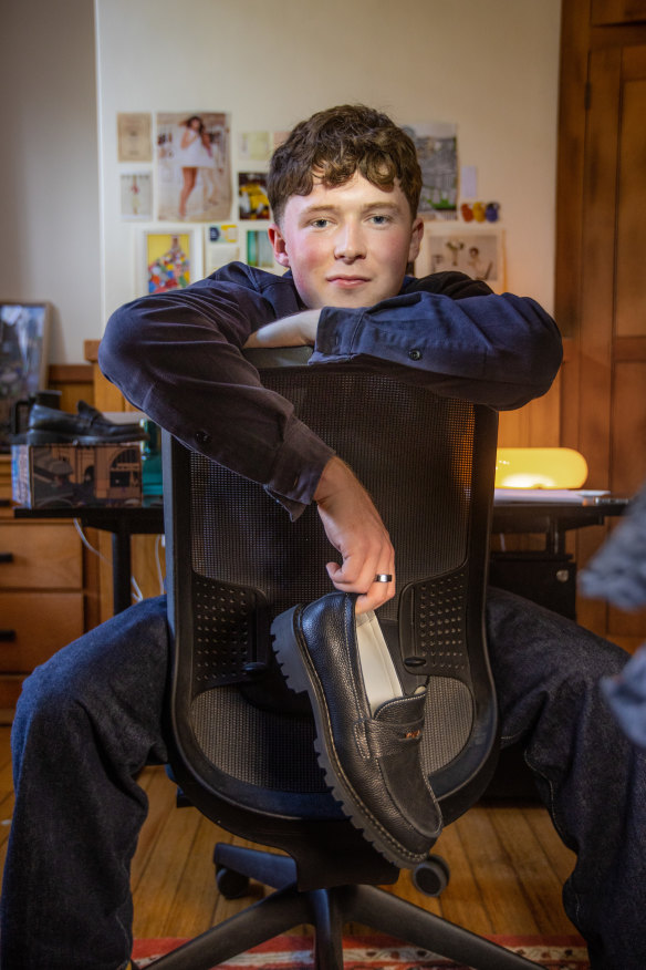 McGuinness with a prototype of his loafer.