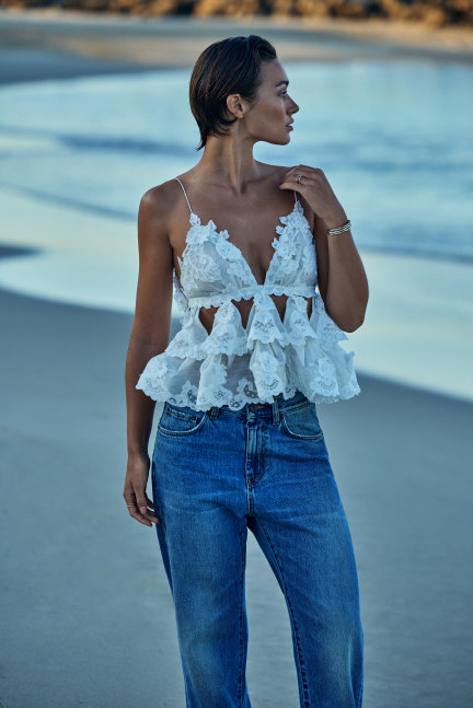 Zimmermann top, $1750. BLK DNM jeans, $490.