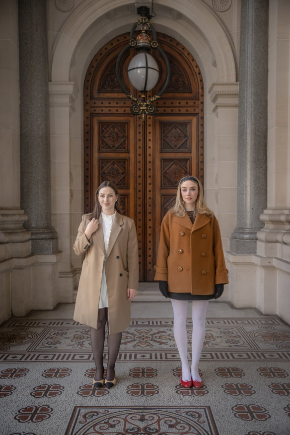 TikTokkers Emily Jackson, left, and Beatrice Caro in Wes Anderson mode at Parliament House.