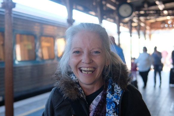 Wagga woman Jan with the XPT train that has carried her from Melbourne.
