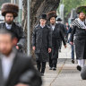 Who are the members of the Adass Israel community?