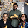 Kylie Kwong with Chatkazz owner-chef Dharmesh Rangparia and Bhavna Kalra at Chatkazz restaurant in Harris Park.