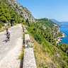 Cycling the Bosnian Ciro Rail Trail, here on the  outskirts of Dubrovnik, above the Adriatic Sea.