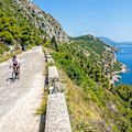 Cycling the Bosnian Ciro Rail Trail, here on the  outskirts of Dubrovnik, above the Adriatic Sea.