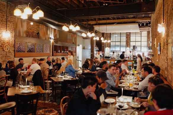 Bar Bruno's interior features exposed brick.